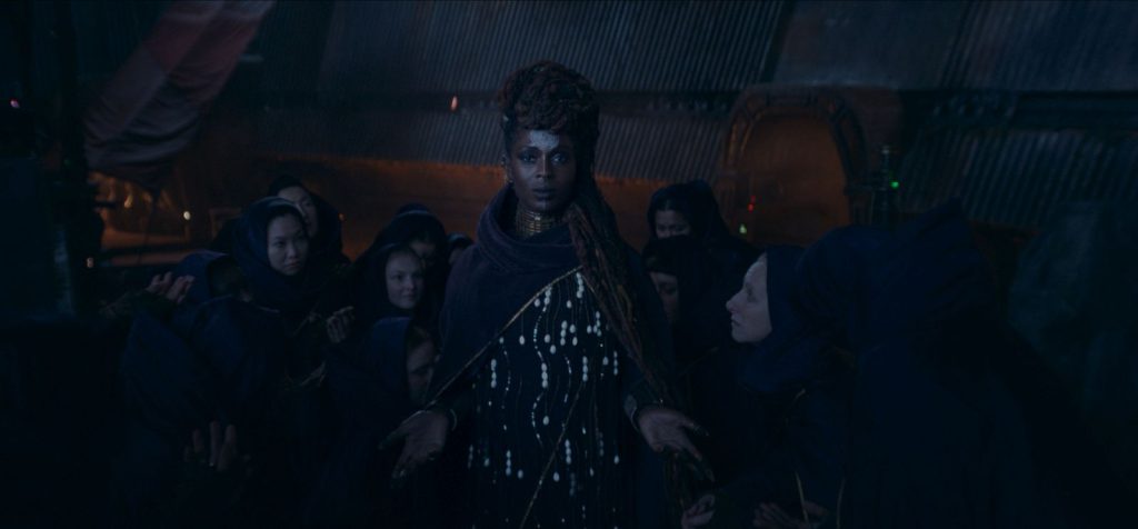 (Center): Mother Aniseya (Jodie Turner-Smith) in Lucasfilm's THE ACOLYTE, exclusively on Disney+. ©2024 Lucasfilm Ltd. & TM. All Rights Reserved.